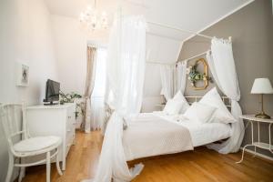 Posteľ alebo postele v izbe v ubytovaní Room4Art Apartments Nr.6 in Center air-conditioned