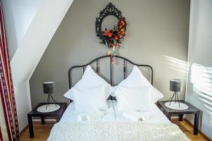 Posteľ alebo postele v izbe v ubytovaní Room4Art Apartments Nr.6 in Center air-conditioned