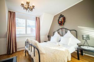 Posteľ alebo postele v izbe v ubytovaní Room4Art Apartments Nr.6 in Center air-conditioned