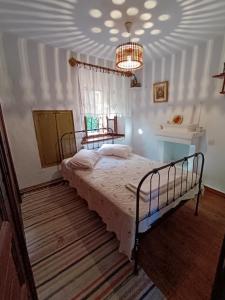 Postel nebo postele na pokoji v ubytování Archontiko Maros