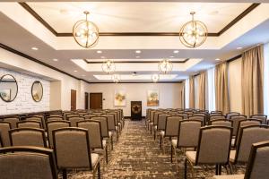 a room with rows of chairs in a room with chandeliers at Hampton Inn & Suites Boerne in Boerne