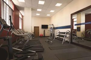 a gym with several treadmills and a treadmill at Hampton Inn & Suites Bradenton in Bradenton