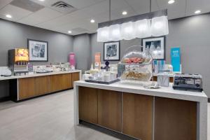 a store with two counters with food items on display at Hampton Inn & Suites Tyler-South in Tyler