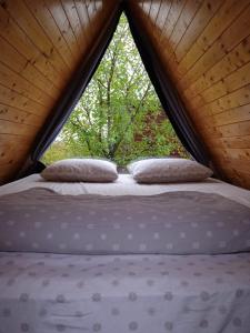Un pat sau paturi într-o cameră la Zen Garden