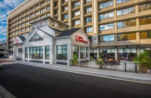 a large building with a store in front of it at Hilton Garden Inn Reagan National Airport in Arlington