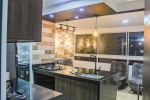 a kitchen with a sink and a counter top at Apartamento cerca al aeropuerto in Rionegro