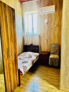 Voodi või voodid majutusasutuse Guesthouse Kamelia toas