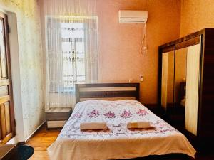 Voodi või voodid majutusasutuse Guesthouse Kamelia toas