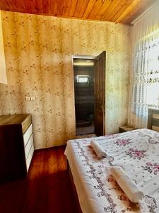 Voodi või voodid majutusasutuse Guesthouse Kamelia toas