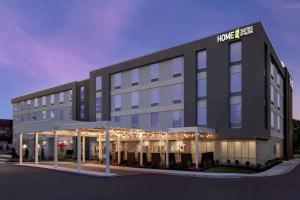 a rendering of a building with a hotel at Home2 Suites By Hilton Owings Mills, Md in Owings Mills