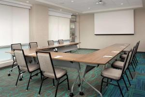 a conference room with a long table and chairs at Home2 Suites By Hilton Owings Mills, Md in Owings Mills +29 photos