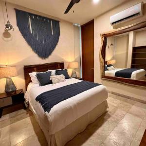 Ένα ή περισσότερα κρεβάτια σε δωμάτιο στο Espectacular Departamento en Aldea Zama +22 φωτογραφίες