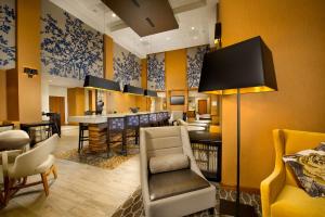 a hotel lobby with a waiting area and a waiting room at Hampton Inn and Suites Washington DC North/Gaithersburg in Gaithersburg