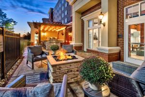 a patio with a fire pit on a house at Homewood Suites by Hilton Cleveland-Beachwood in Beachwood
