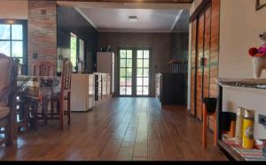 a living room with a kitchen and a dining room at CASA de PURMAMARCA in Purmamarca