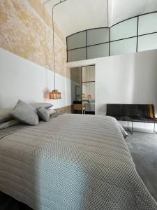 Ένα ή περισσότερα κρεβάτια σε δωμάτιο στο Guayabo estudio