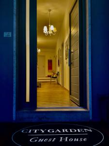 a view of a city garden guest house through a doorway at City Garden Guest House in Olbia