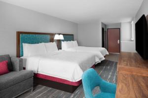 Rúm í herbergi á Hampton Inn Phoenix - Biltmore