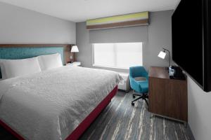 Rúm í herbergi á Hampton Inn Phoenix - Biltmore