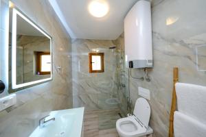 Koupelna v ubytování Chalet Kujta