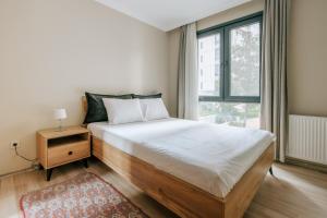 Postel nebo postele na pokoji v ubytování Modern Flat By Bagdat Avenue and Bostanci Coast