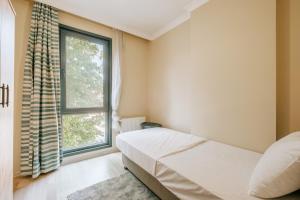 Postel nebo postele na pokoji v ubytování Modern Flat By Bagdat Avenue and Bostanci Coast