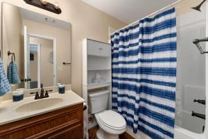 a bathroom with a sink and a toilet and a shower at Bright & spacious 3 bedroom home Amazing location in Temple