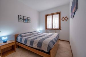 Postel nebo postele na pokoji v ubytování Happy Guest Apartments - Mountain Panorama Borno