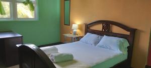 Postel nebo postele na pokoji v ubytování Danglez Bed & Breakfast