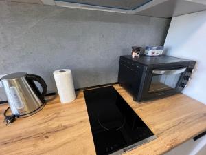 Kuhinja oz. manjša kuhinja v nastanitvi Apartment in Skanderbeg Square - Tirana Center 2