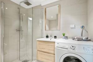 Ένα μπάνιο στο Demims Apartments Oslo Airport