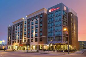 a rendering of a hotel building at night at Hilton Garden Inn Memphis Downtown Beale Street in Memphis