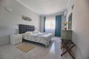 Ένα ή περισσότερα κρεβάτια σε δωμάτιο στο Cosy & Airy @ Albufeira