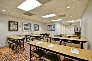 a classroom with tables and chairs in a room at Homewood Suites by Hilton Phoenix-Biltmore in Phoenix