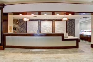 a lobby of a hotel with a reception counter at Homewood Suites by Hilton Washington, D.C. Downtown in Washington
