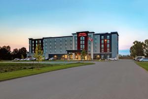 a rendering of a hotel with a parking lot at Hampton Inn & Suites Belleville in Belleville