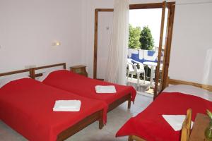 Postel nebo postele na pokoji v ubytování Hotel Sevilli
