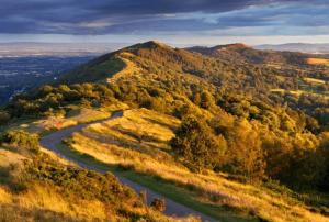 a view of a mountain with a river at Charming Malvern Cottage with Outstanding Views in Malvern Wells