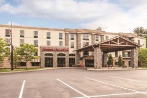 a rendering of a hotel with a parking lot at Hampton Inn & Suites Lake George in Lake George