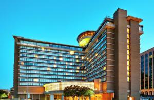 a building with a clock tower on top of it at DoubleTree by Hilton Washington DC – Crystal City in Arlington