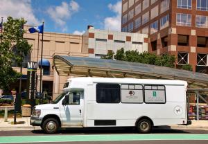 a white truck parked in front of a building at DoubleTree by Hilton Washington DC – Crystal City in Arlington