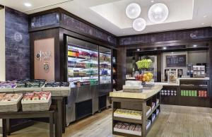 a grocery store with fruits and vegetables on display at DoubleTree by Hilton Washington DC – Crystal City in Arlington