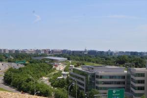 a view of a city with a building and a street at DoubleTree by Hilton Washington DC – Crystal City in Arlington