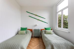 Кровать или кровати в номере Jasqłka Apartament z widokiem
