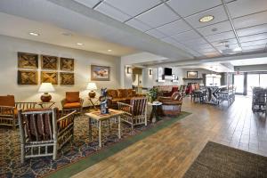 a lobby with couches and chairs and tables at Hampton Inn Bozeman in Bozeman