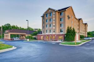 a parking lot in front of a building at Homewood Suites by Hilton Bel Air in Riverside