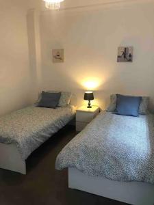 Ένα ή περισσότερα κρεβάτια σε δωμάτιο στο Large Detached Villa