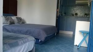 Postel nebo postele na pokoji v ubytování Apartments Dijan