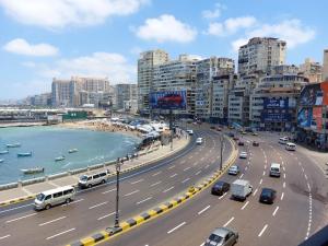 a busy city street with cars on a highway at شقة فندقية علي البحر مباشرة بجليم in Alexandria