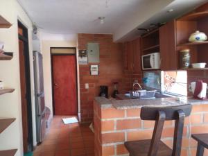 Una cocina o zona de cocina en Inolvidable Casa en San Jeronimo